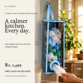Premium hanging mesh plastic-bag organizer in a warm kitchen — Rs. 1,499, free cash on delivery